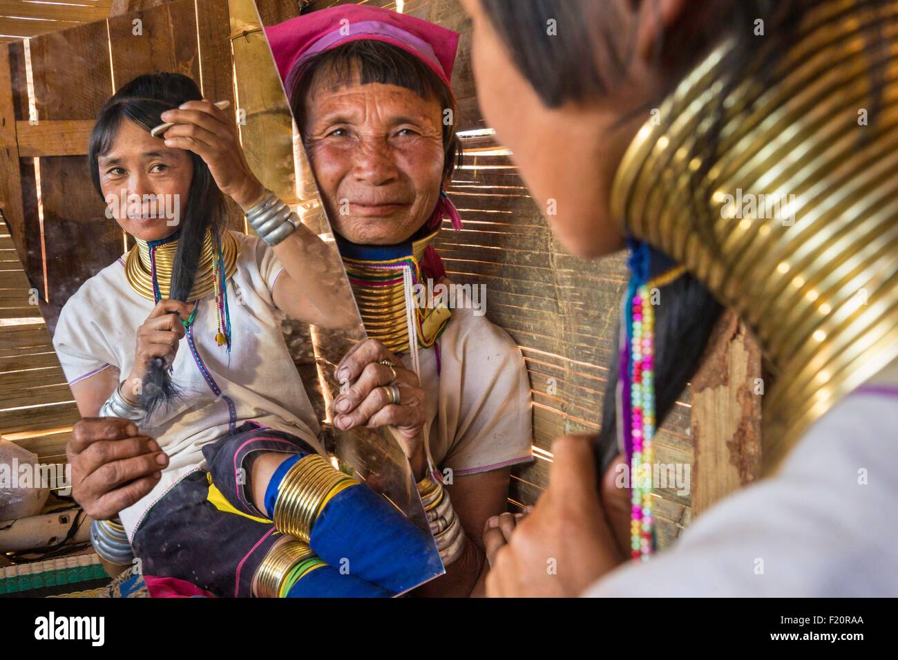 Myanmar (Burma), Kayah state, Kayan tribe (Padaung), Dau Ki (Pan Pat group), Moe Hope and Moe Bone getting ready for dancing Stock Photo