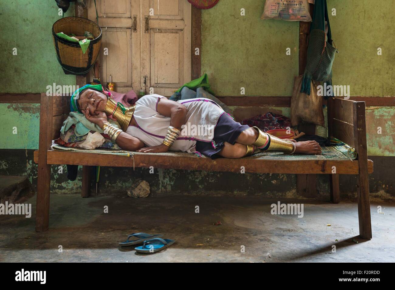 Myanmar (Burma), Kayah state, Kayan tribe (Padaung), Loikaw area, Kon Ta, Moe Ki a woman named giraffe women having rest Stock Photo