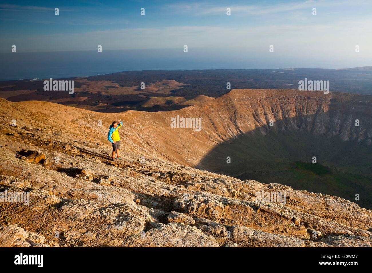 Spain, Canaries Islands, Lanzarote island, crater of the Caldera Blanca, man practising the hike Stock Photo