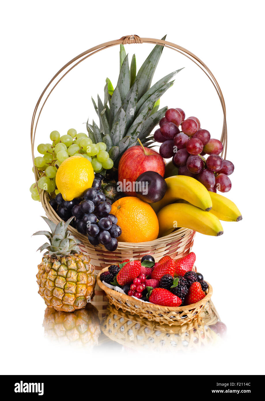 still-life-of-multi-coloured-fruits-in-big-basket-on-white-background
