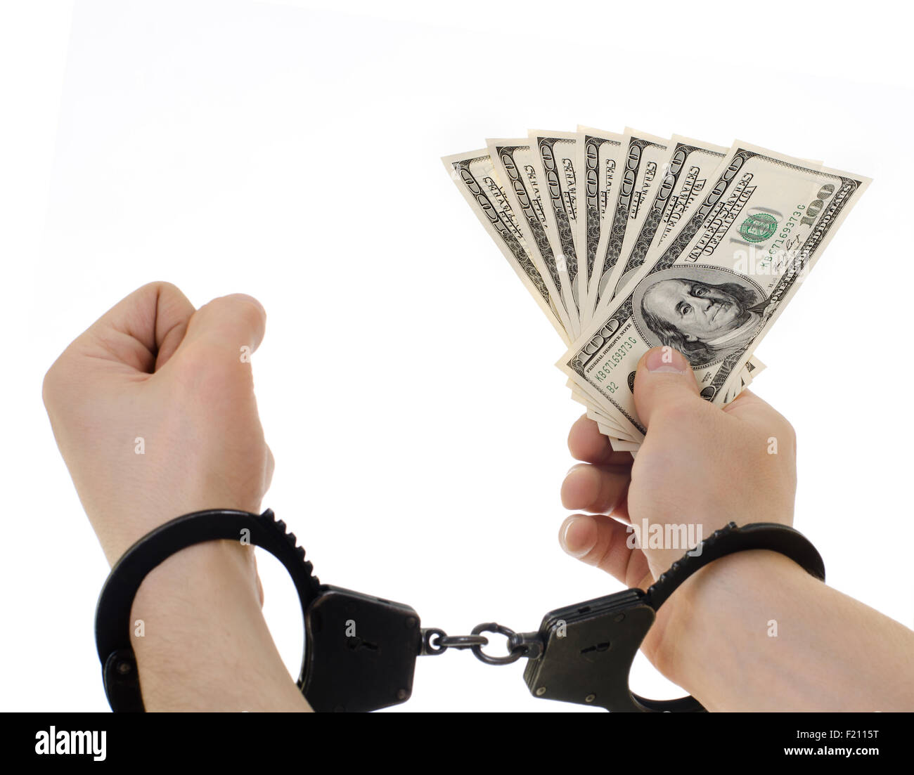 hand in shackle hold  currency note dollars, on white background, isolated Stock Photo