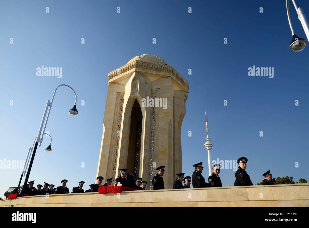 Azerbaijan, Baku, Martyrs' Lane (Alley of Martyrs), Eternal Flame memorial dedicated to those killed by the soviet army during Black January on 20-01-1990 and later to those killed in Nagorno-Karabakh war, military ceremony during the 25th Martyrs' Day co Stock Photo