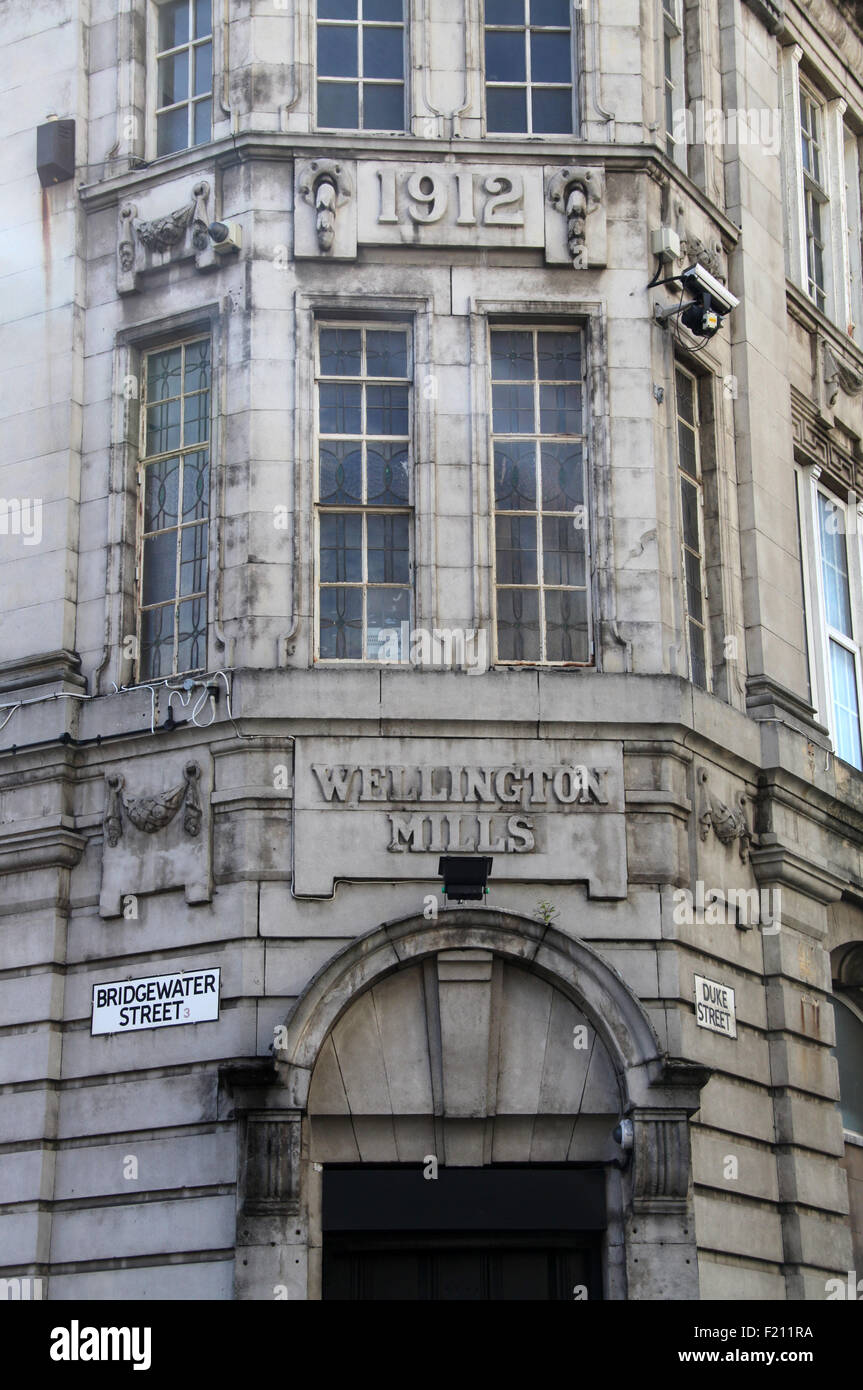 Wellington Mills building dated 1912 in Manchester Stock Photo