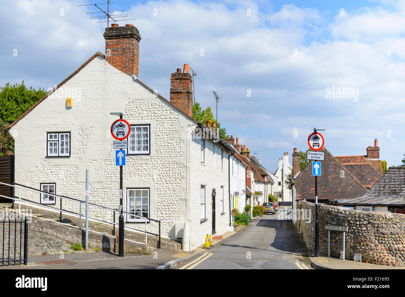 Narrow picturesque street in Angmering Village, West Sussex, England, UK. Stock Photo