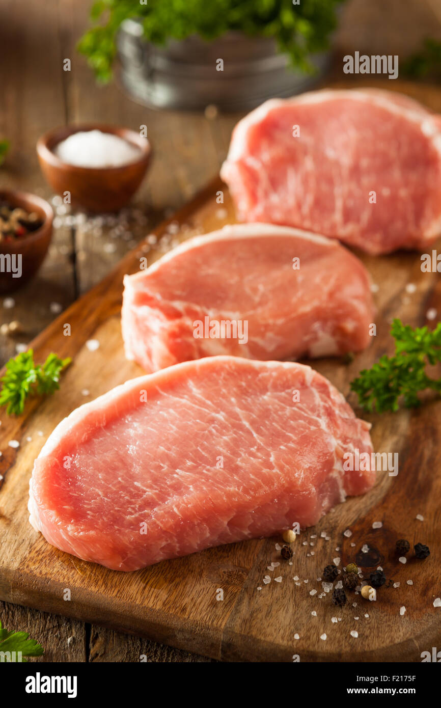 Raw Organic Boneless Pork Chops Ready to Cook Stock Photo Alamy