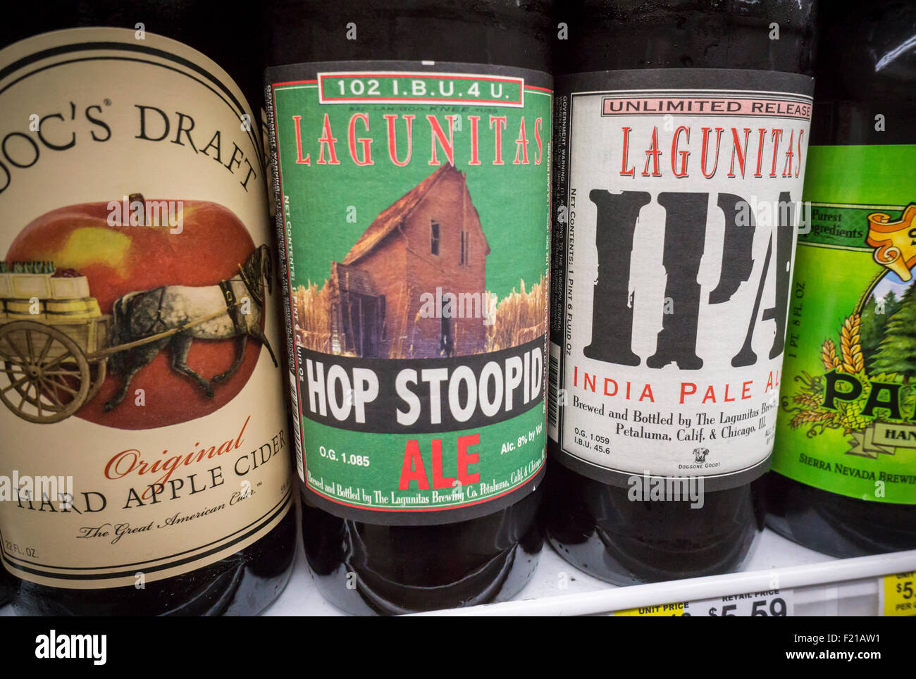 Bottles of Lagunitas beer in a supermarket cooler on Tuesday, September 8, 2015. Amsterdam based Heineken brewers has bought a fifty percent stake in California based Lagunitas Brewing Company in an undisclosed cash deal.  Heinken is the largest brewer in Europe, also producing Amstel, Tecate and Dos Equis. Lagunitas will continue to operate separately. (© Richard B. Levine) Stock Photo