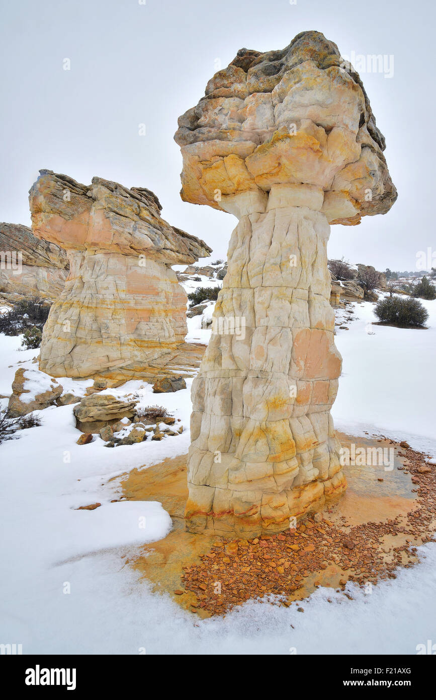 Hoodoo in snow along Scenic Highway 12 as it descends into Grand Staircase Escalante National Monument in southern Utah Stock Photo