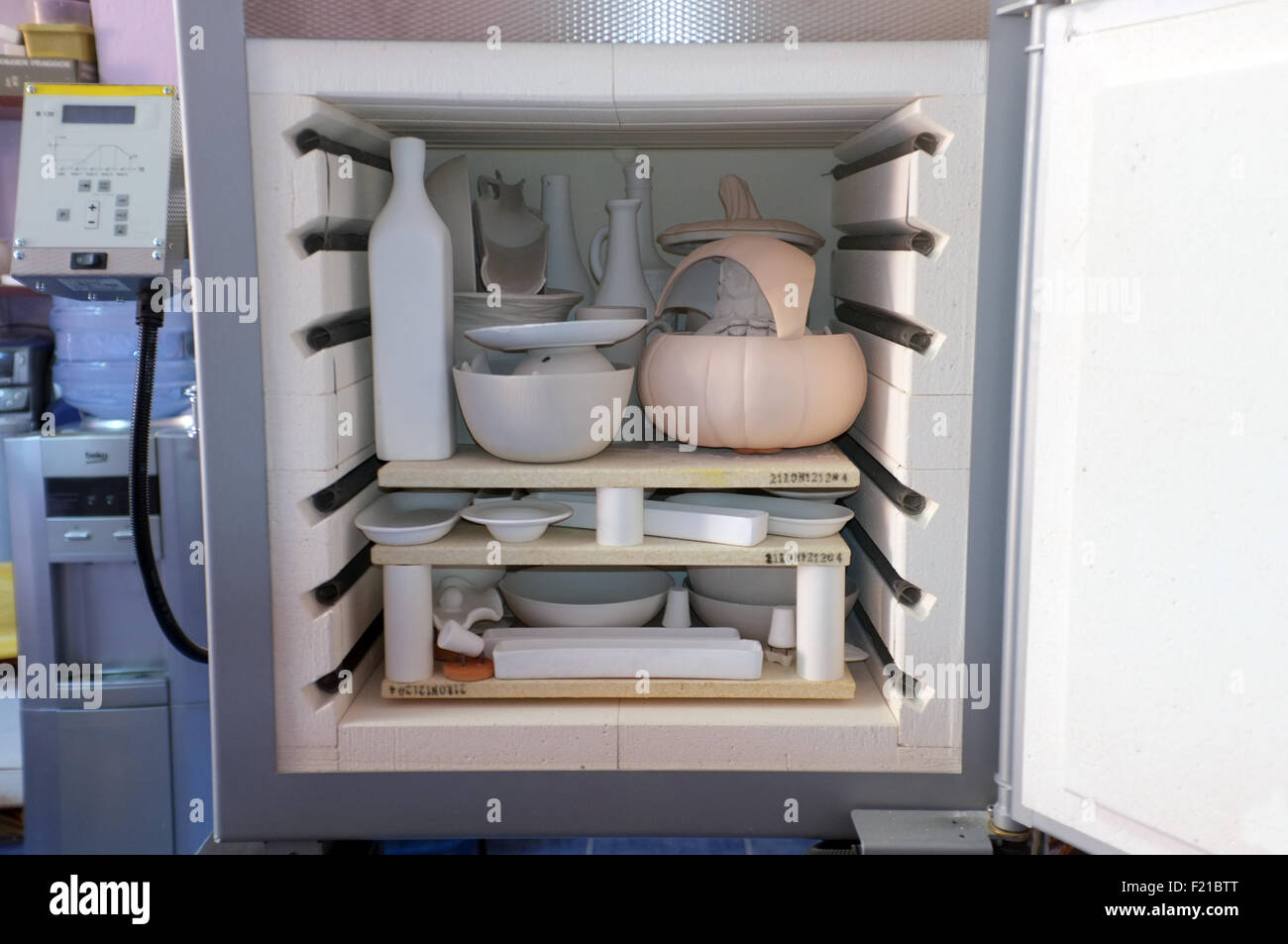 Small pottery oven with ceramics inside Stock Photo Alamy