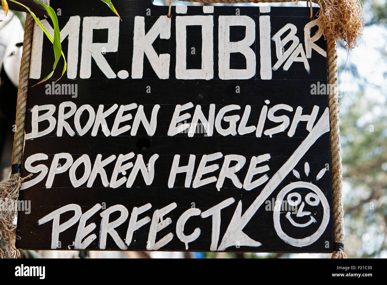 Thailand, Beach bar sign saying Broken English Spoken Here. Stock Photo