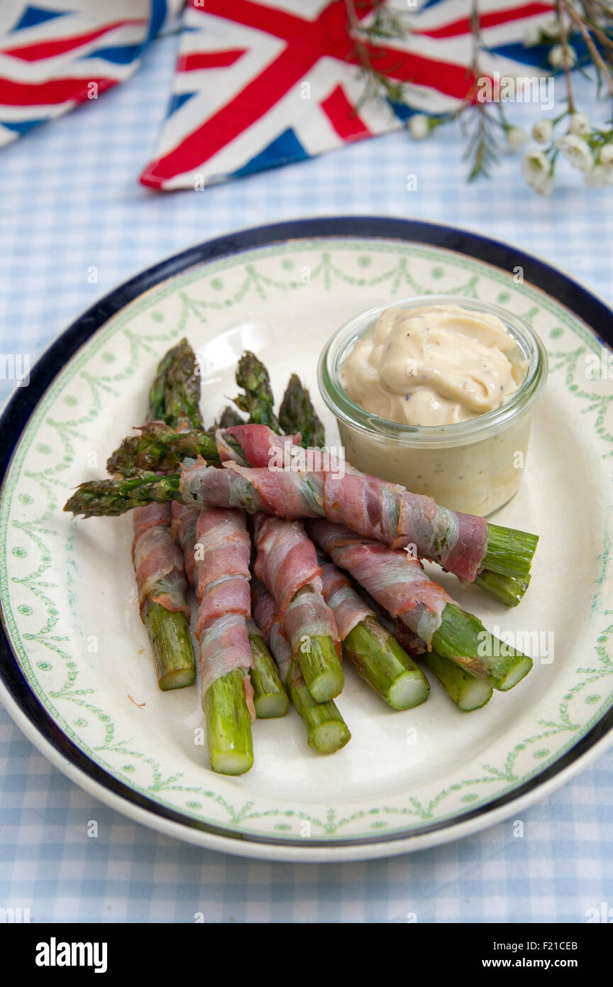 Asparagus wrapped with Parma ham. a UK food foods "small dish" "small