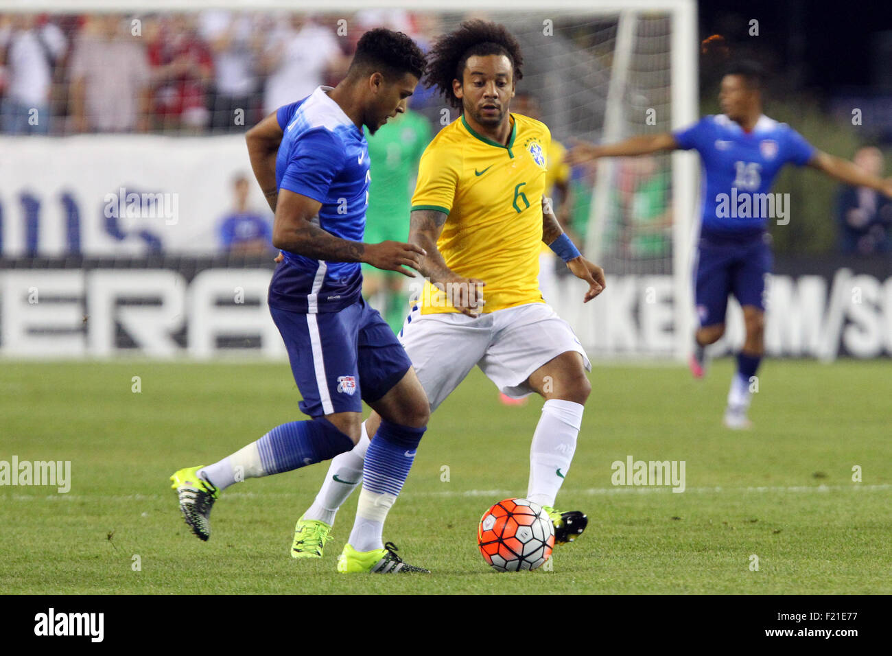 September 8, 2015; Foxborough, MA, USA; United States midfielder DeAndre Yedlin (2) and Brazil midfielder Marcelo (6) in action during the first half of the Brazil and USA international friendly match at Gillette Stadium. Brazil defeated USA 4-1. Anthony Nesmith/Cal Sport Media Stock Photo