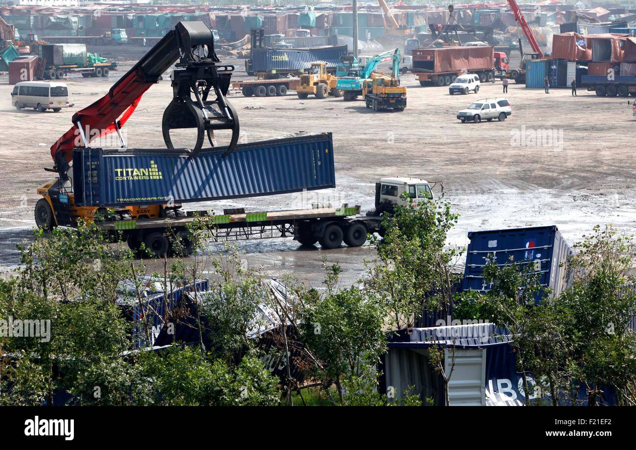 Tianjin. 10th Sep, 2015. A crane moves away a destroyed container at the core area of an warehouse explosion in Tianjin, north China, Sept. 8, 2015. The death toll from the Tianjin warehouse explosions rose to 162 on Tuesday with 11 people still unaccounted for, according to rescue authorities. Two blasts ripped through a warehouse at around 11:30 p.m. on Aug. 12 in Tianjin Port, where large amounts of toxic chemicals were stored, including around 700 tonnes of sodium cyanide. Credit:  Xinhua/Alamy Live News Stock Photo