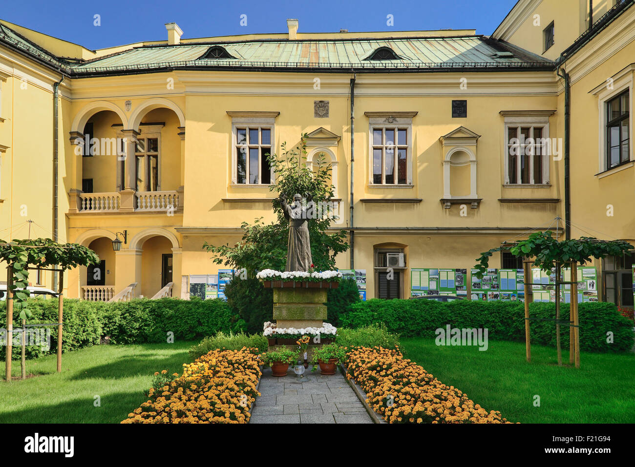 Poland, Krakow, Archbishop's Palace or Palac Biskupi, Palace courtyard with statue of Saint John Paul 2nd. Stock Photo