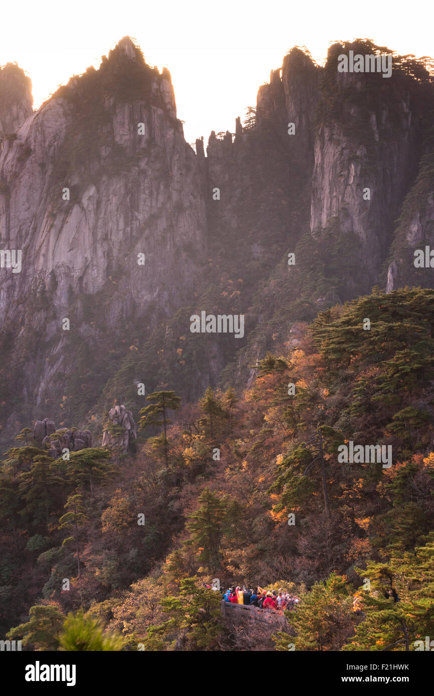 Group of tourists gathered for sunrise at North Sea vista, Yellow Mountain, Huang Shan, Anhui province, China, Asia Stock Photo