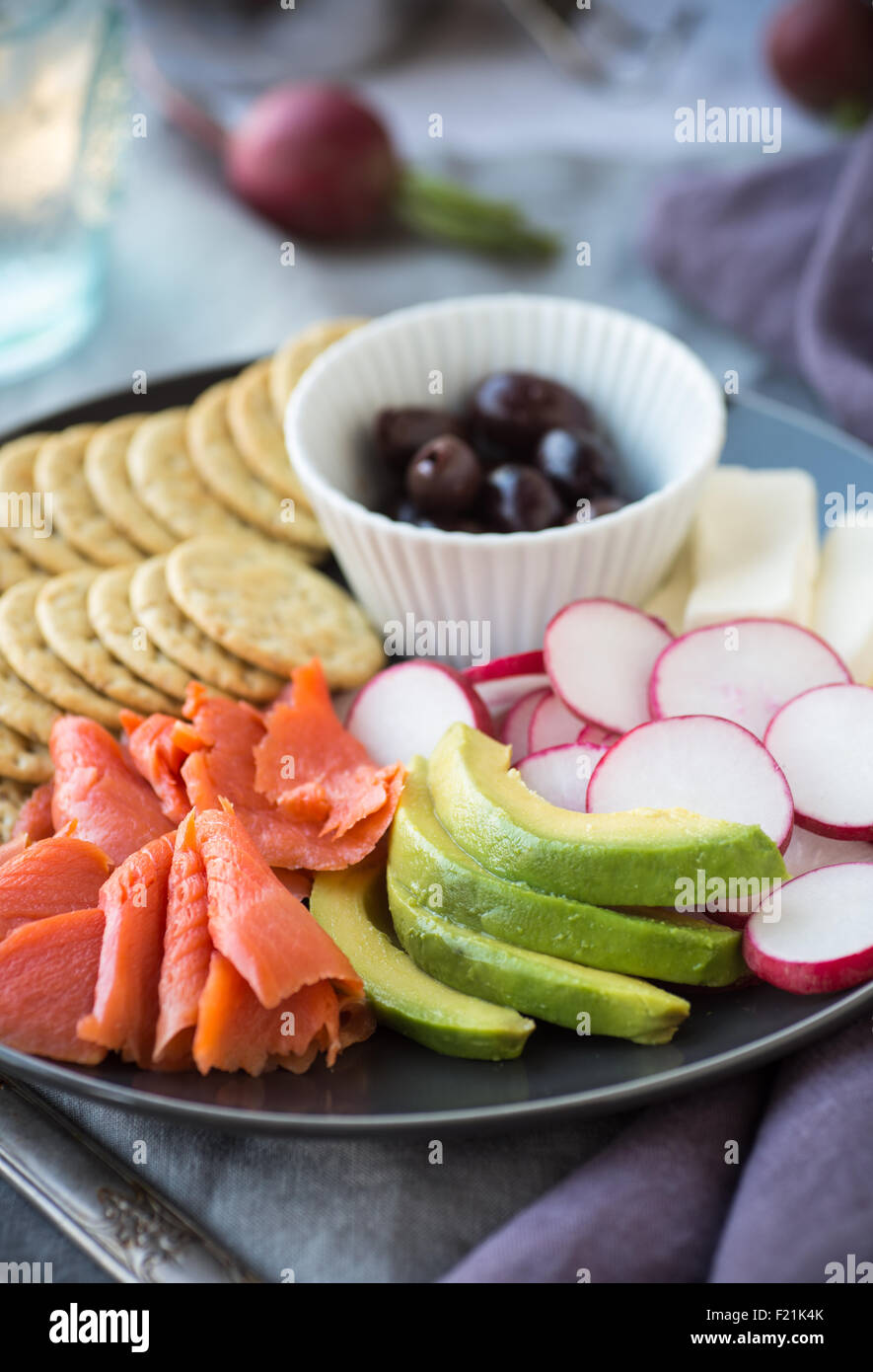 Cold smoked salmon snack with avocado and radishes Stock Photo Alamy