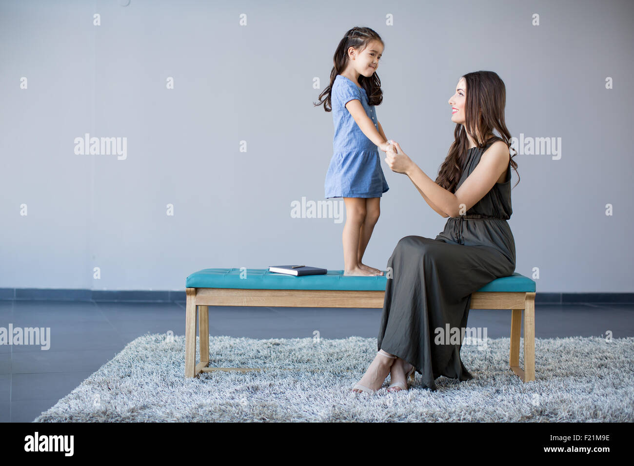 Young woman and little girl Stock Photo