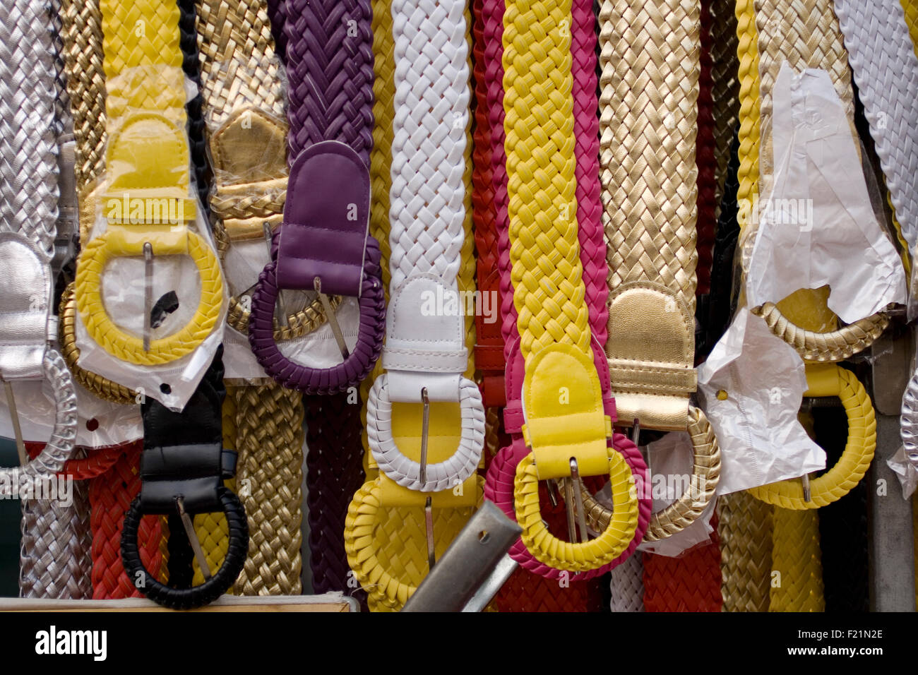 Colorful belts in a street market Stock Photo
