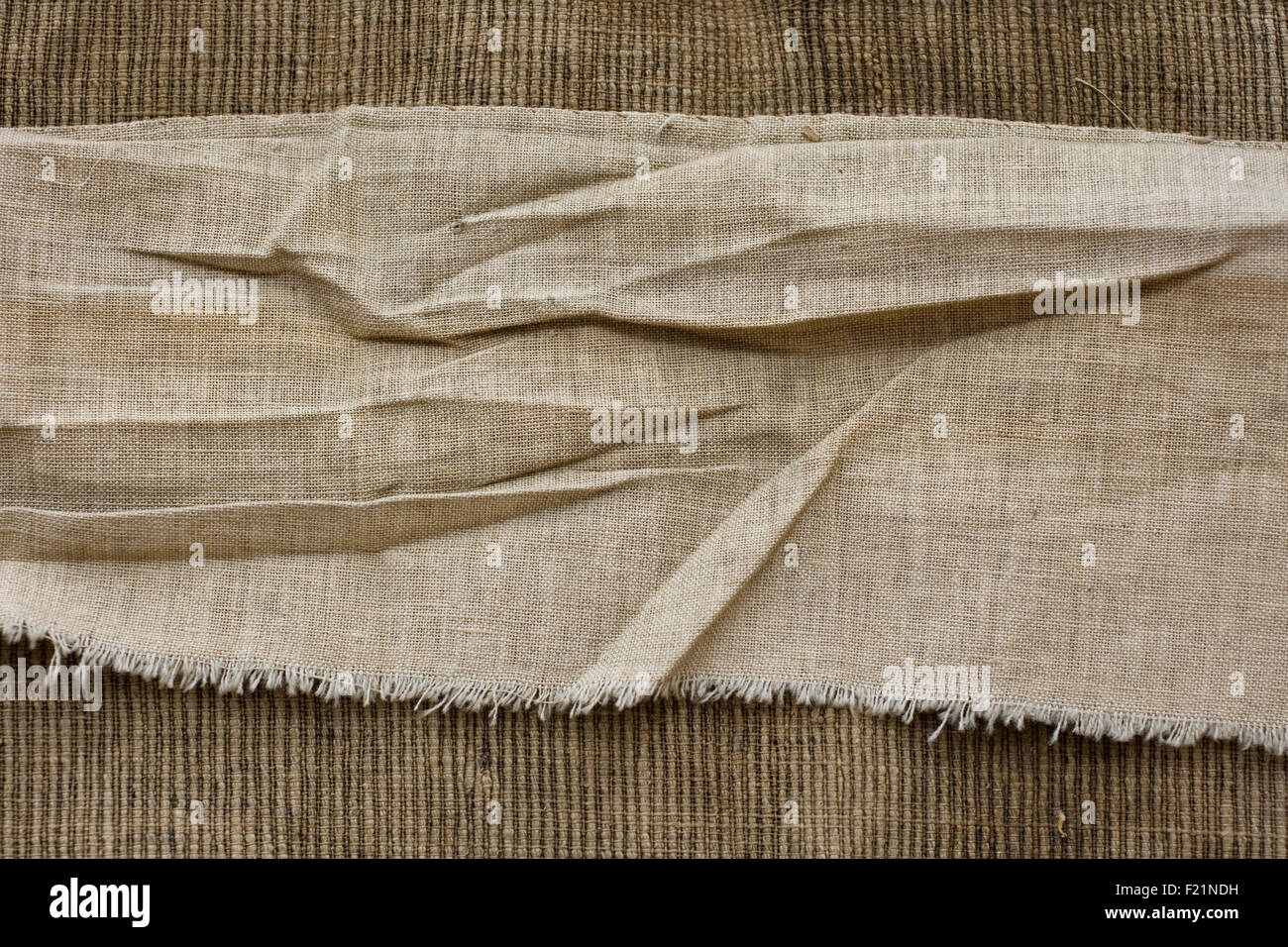 An old wool cloth material isolated on a white background Stock