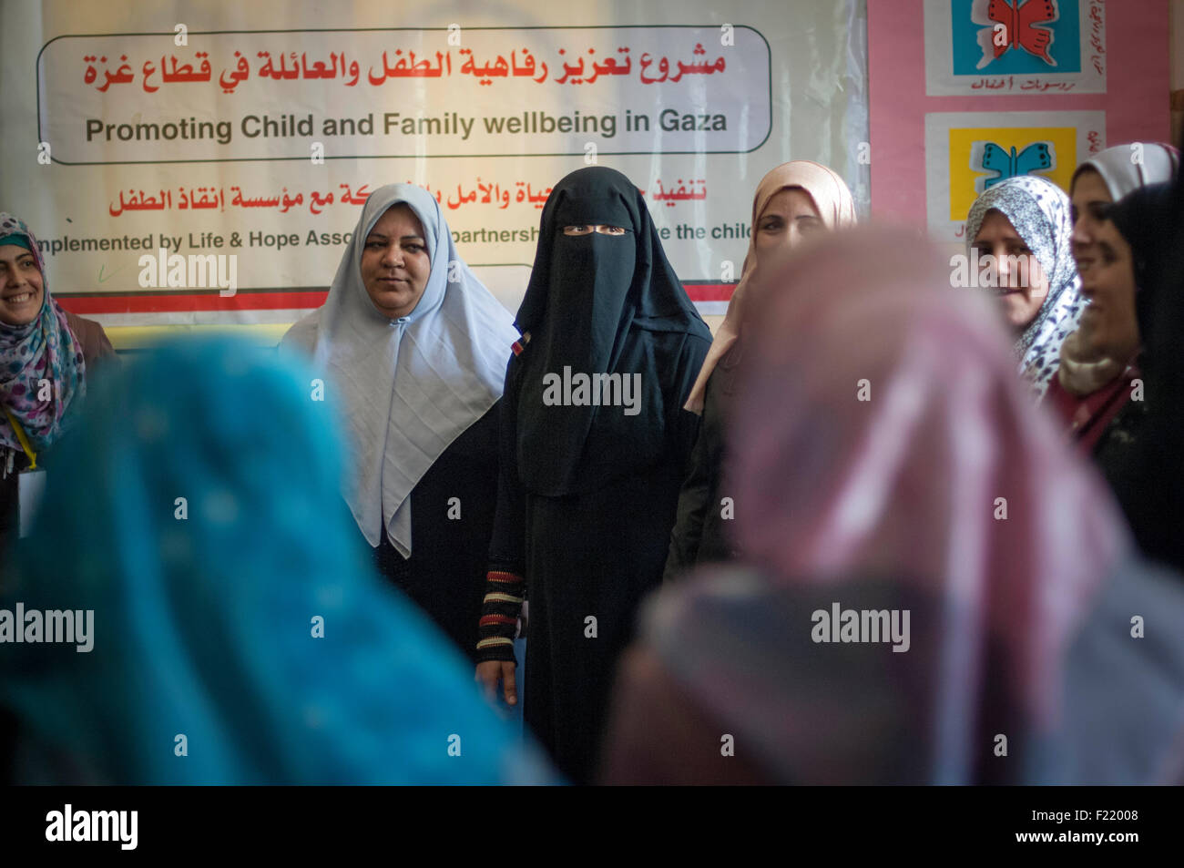 Women attending stress busting counseling session with activities designed to counter Psychological problems in the Gaza Strip. Stock Photo