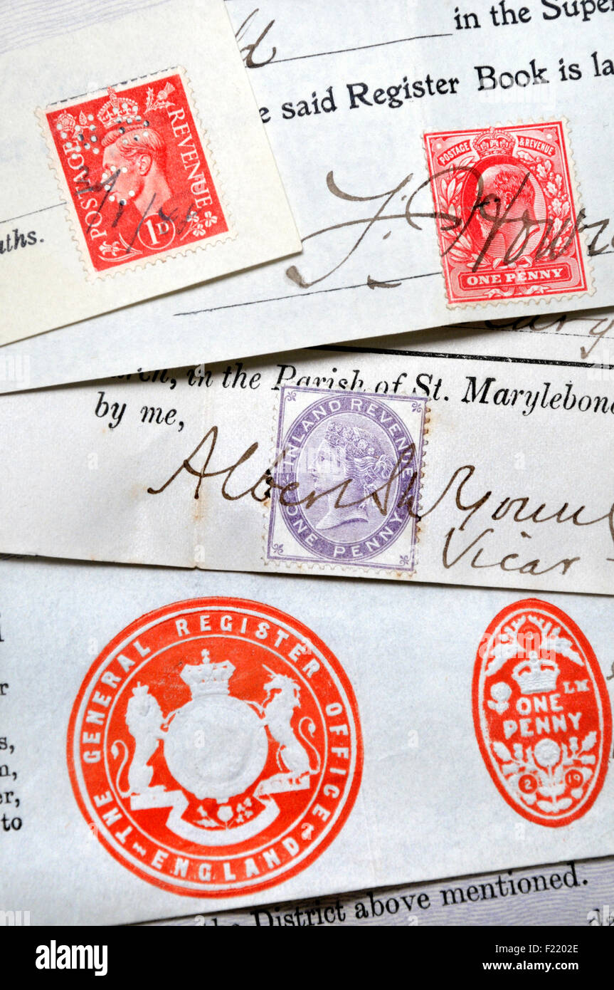 Documents (British) made official with signatures and postage stamps - Queen Victoria, Edward VII, George VI Stock Photo