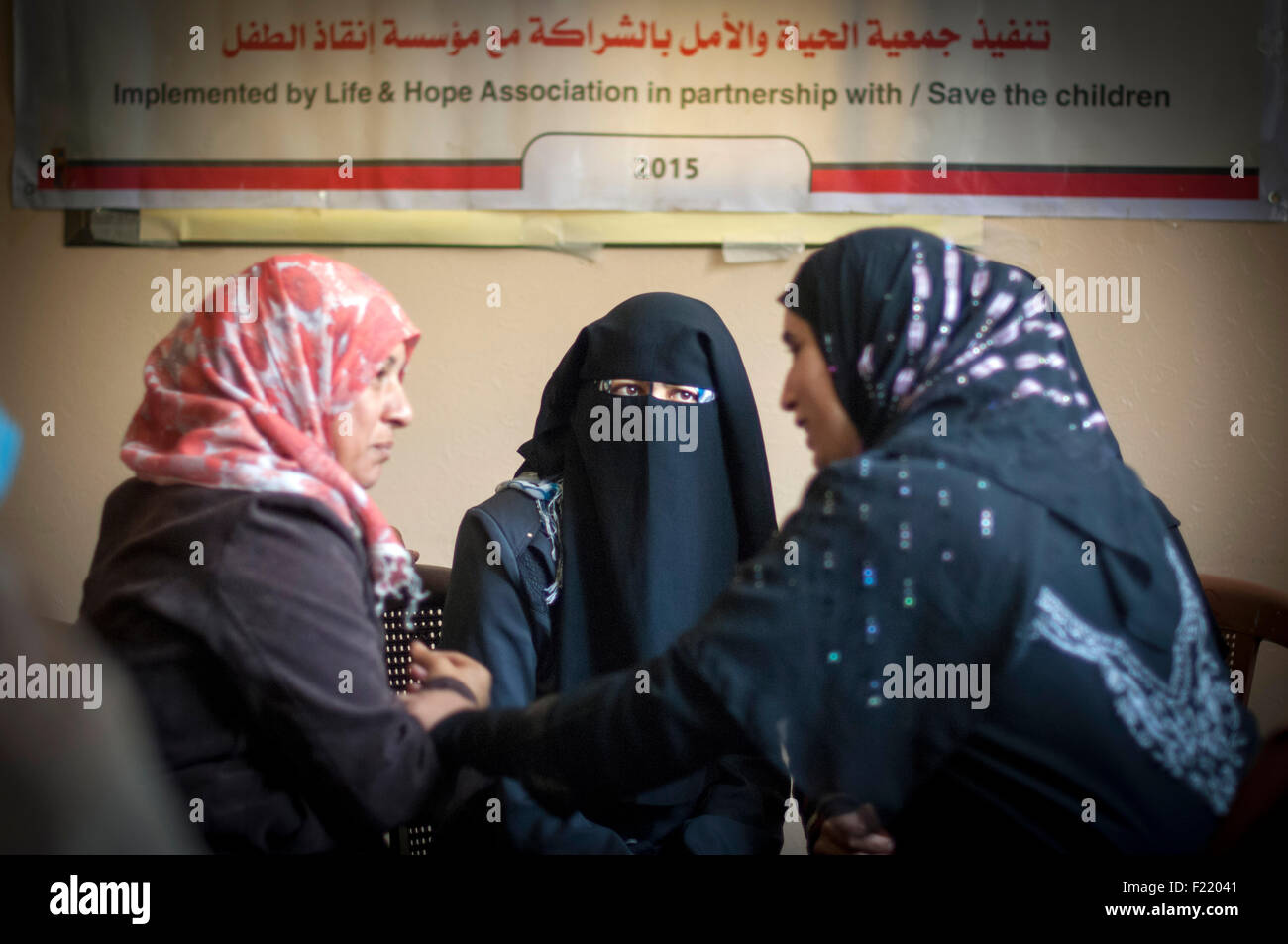 Women attending stress busting counseling session with activities designed to counter Psychological problems in the Gaza Strip. Stock Photo