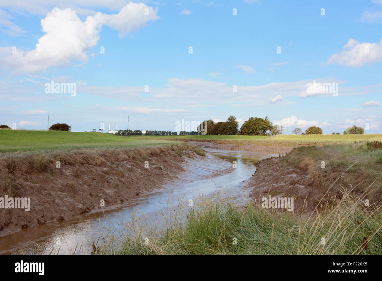 Low tide on River Nene at Foul Anchor, Wisbech, in Cambridgeshire, revealing muddy riverbanks. Stock Photo