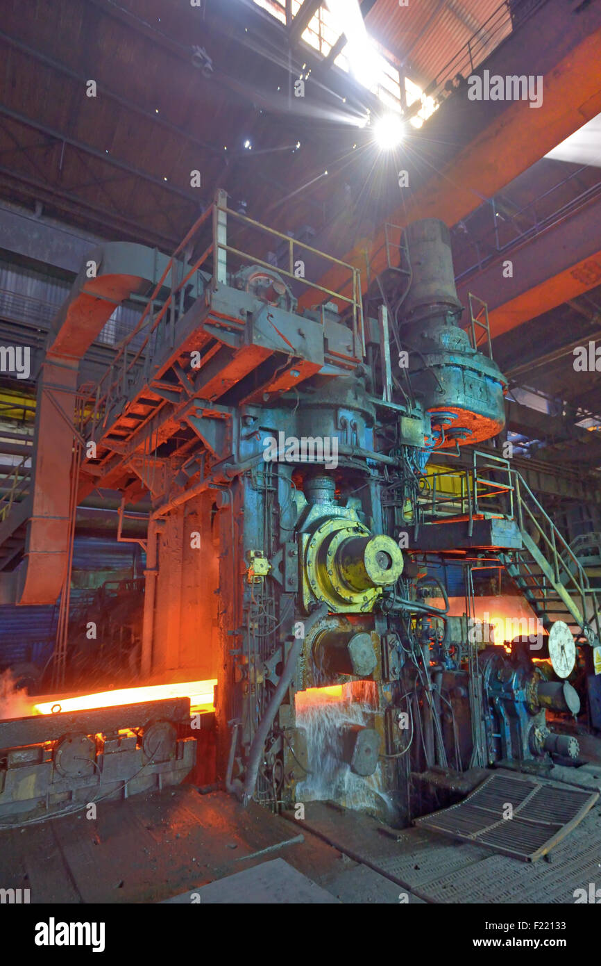 hot steel on conveyor inside of steel plant Stock Photo