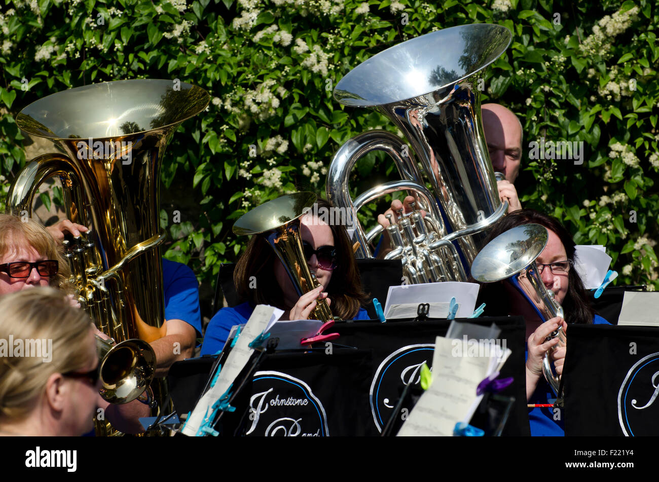 Musicians in the Johnstone Brass Band playing at the Water of Leith