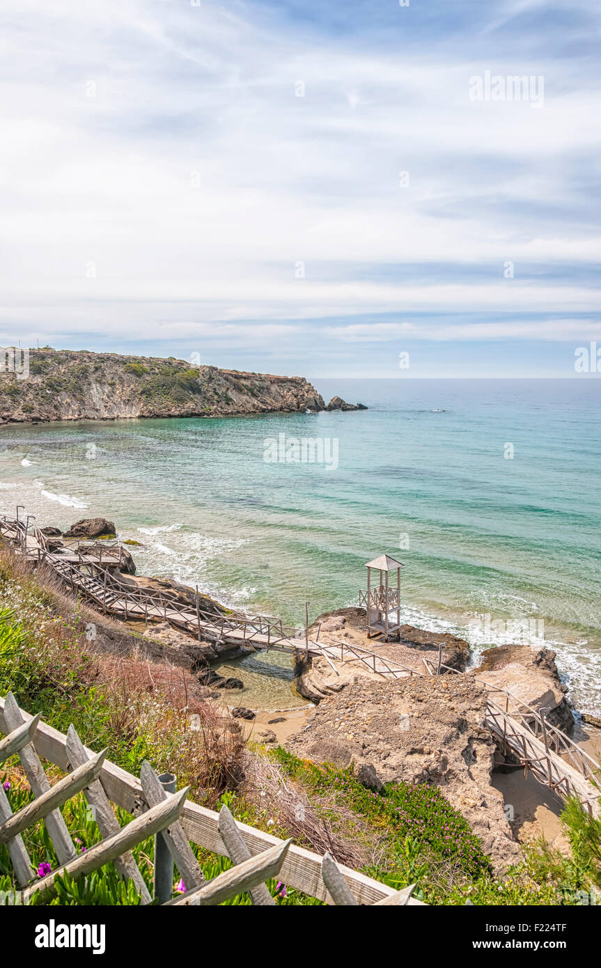 A view of one of the beaches by cliffs at Makrygialos on the Greek island of Crete. Stock Photo