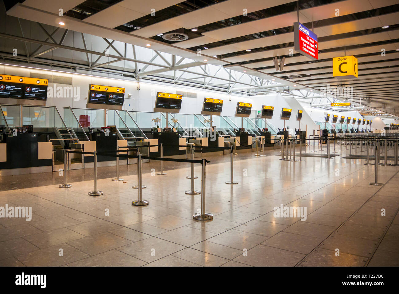 Closed check in desks at Heathrow Airport, London Stock Photo