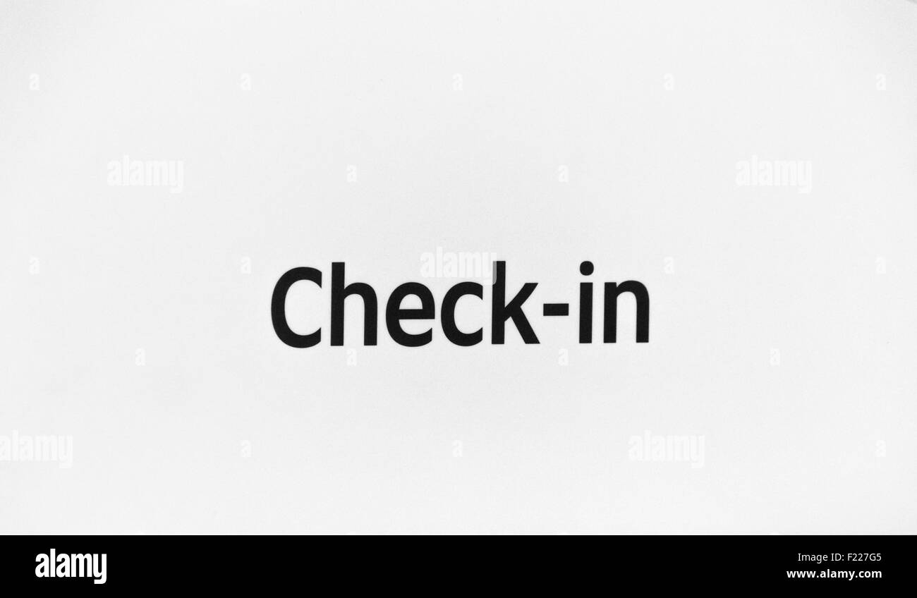 Airport check-in sign on white background Stock Photo
