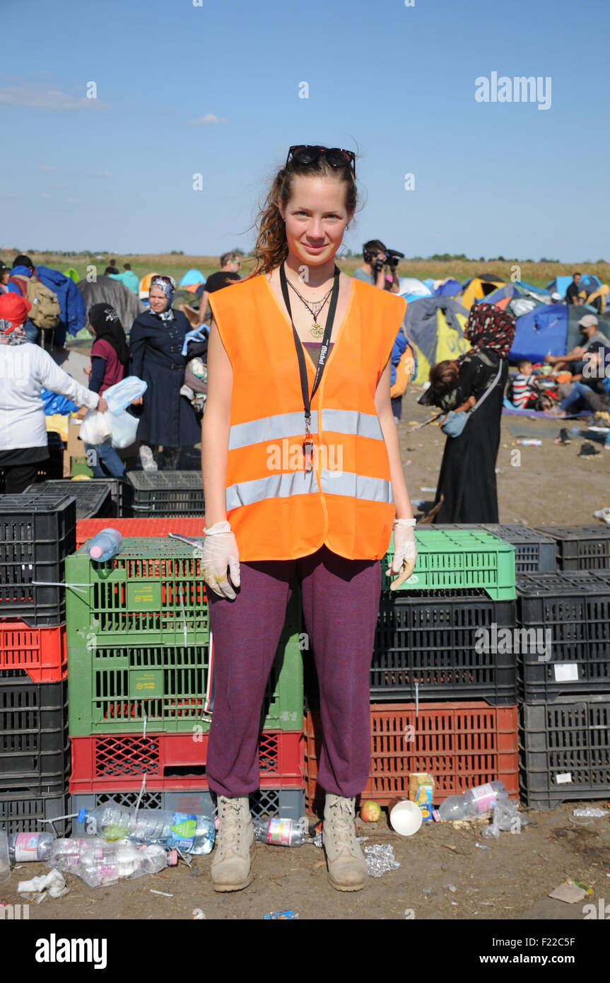 The 22 year-old Clara Flaksman from Neustadt an der Weinstrasse stands on  the premises of the refugee shelter in Roeszke in Hungary, 9 September  2015. She hands out clothes and makes soup