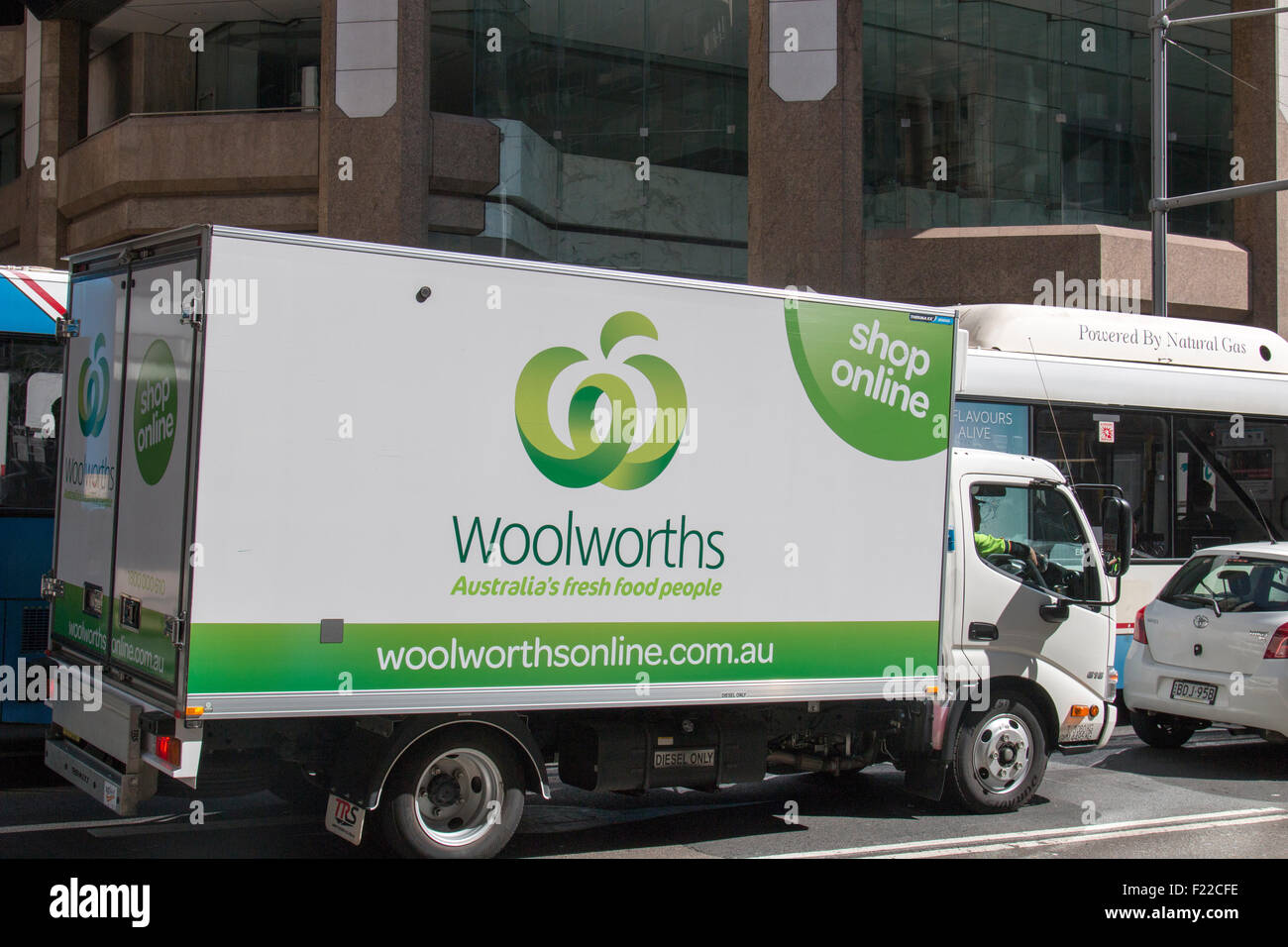 Australian Woolworths supermarket delivery vehicle in Sydney taking food to customers who have ordered online for home delivery, Australia Stock Photo