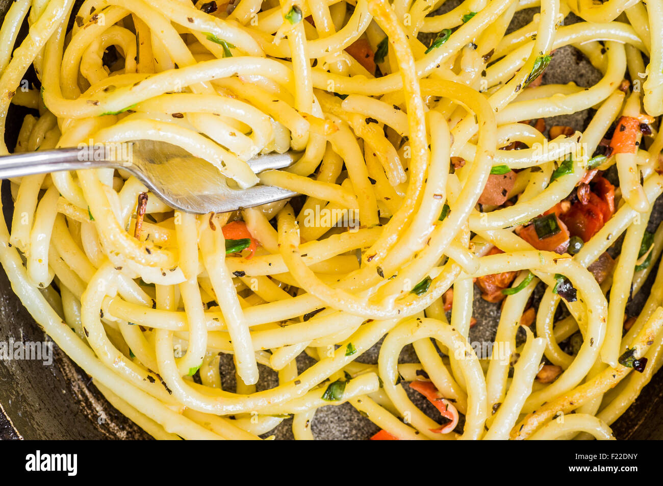 Bucatini pasta with a fork closeup top view Stock Photo Alamy