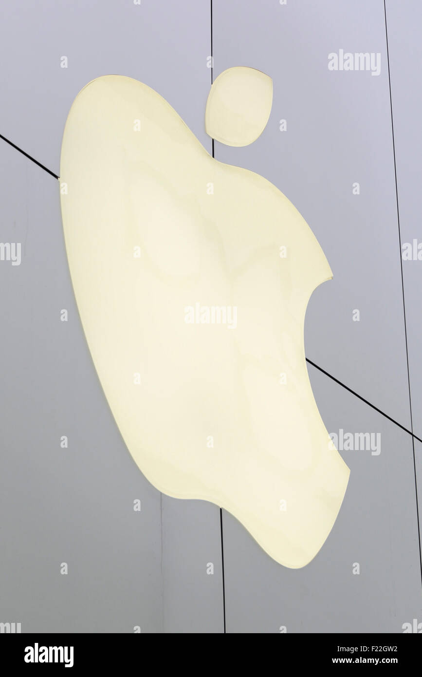 Apple's sign on display outside its store in Ginza on September 10, 2015, Tokyo, Japan. Even after Apple CEO Tim Cook announced their new products iPad Pro, iPhone 6s, iPhone 6s Plus and Apple TV on September 9, 2015, hardcore Japanese fans were nowhere to be seen outside the principal stores in Ginza and Omotesando. This could be because of heavy rain that hit Japan this week caused by typhoon Etau, or perhaps Apple fans are now less excited by this clockwork new release cycle. In Australia the media already reported that the first Apple fan had set up a tent in front of the store in Sydney. Stock Photo