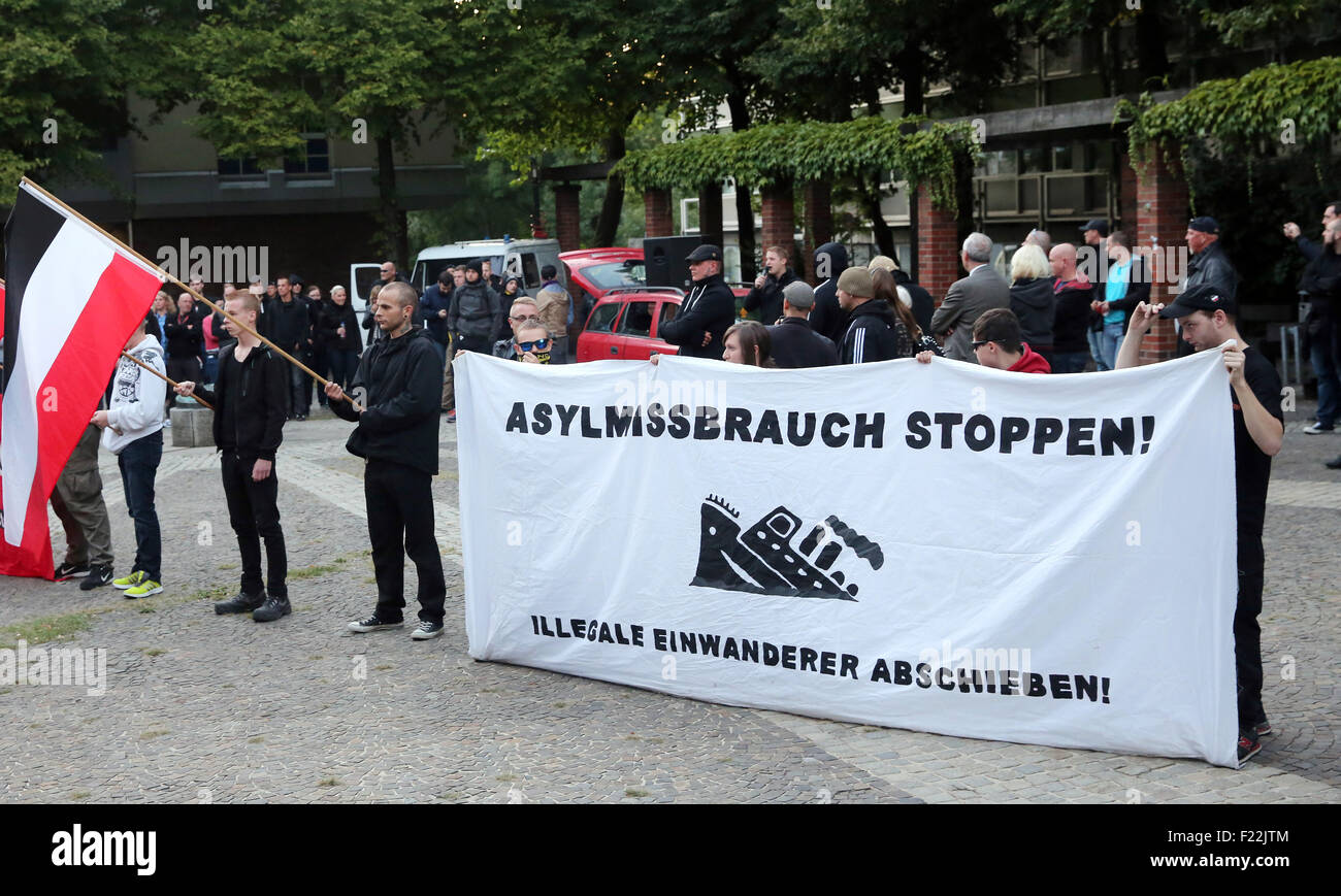 Supporters of the german far right neo-nazi party DIE RECHTE (the rights)  protest in Dortmund/Germany, Sept. 9th. 2015 against the influx of migrants from Asia, Africa and the Middle East to Germany. The banner says 'stop abuse of asylum -  deport illegal migrants' Stock Photo