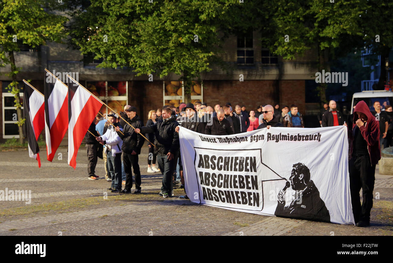 Supporters of the german far right neo-nazi party DIE RECHTE (the rights)  protest in Dortmund/Germany, Sept. 9th. 2015 against the influx of migrants from Asia, Africa and the Middle East to Germany. The banner says 'deport, deport, deport' Stock Photo