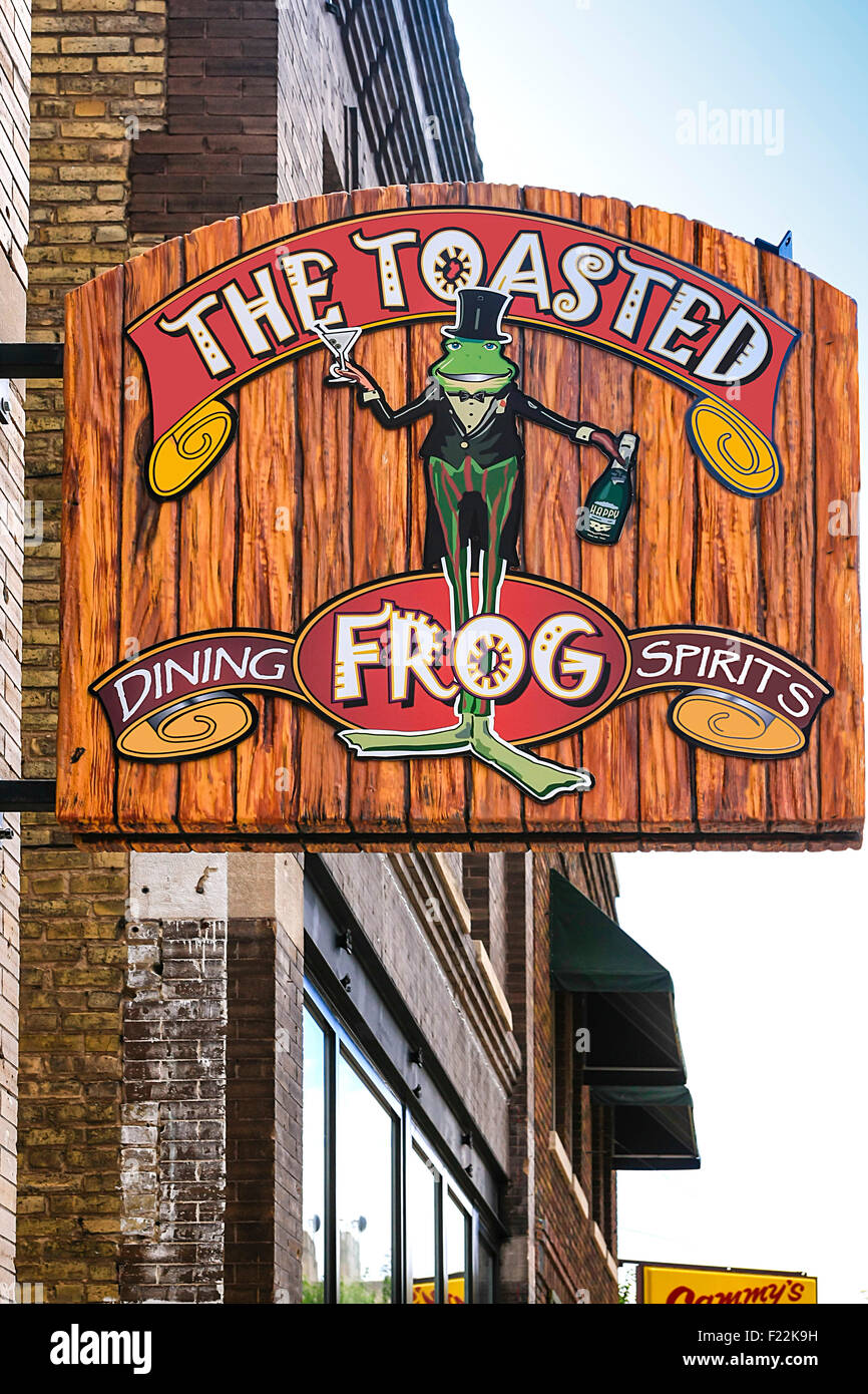 The Toasted Frog restaurant overhead sign on N. Broadway Dr in downtown Fargo N. Dakota Stock Photo