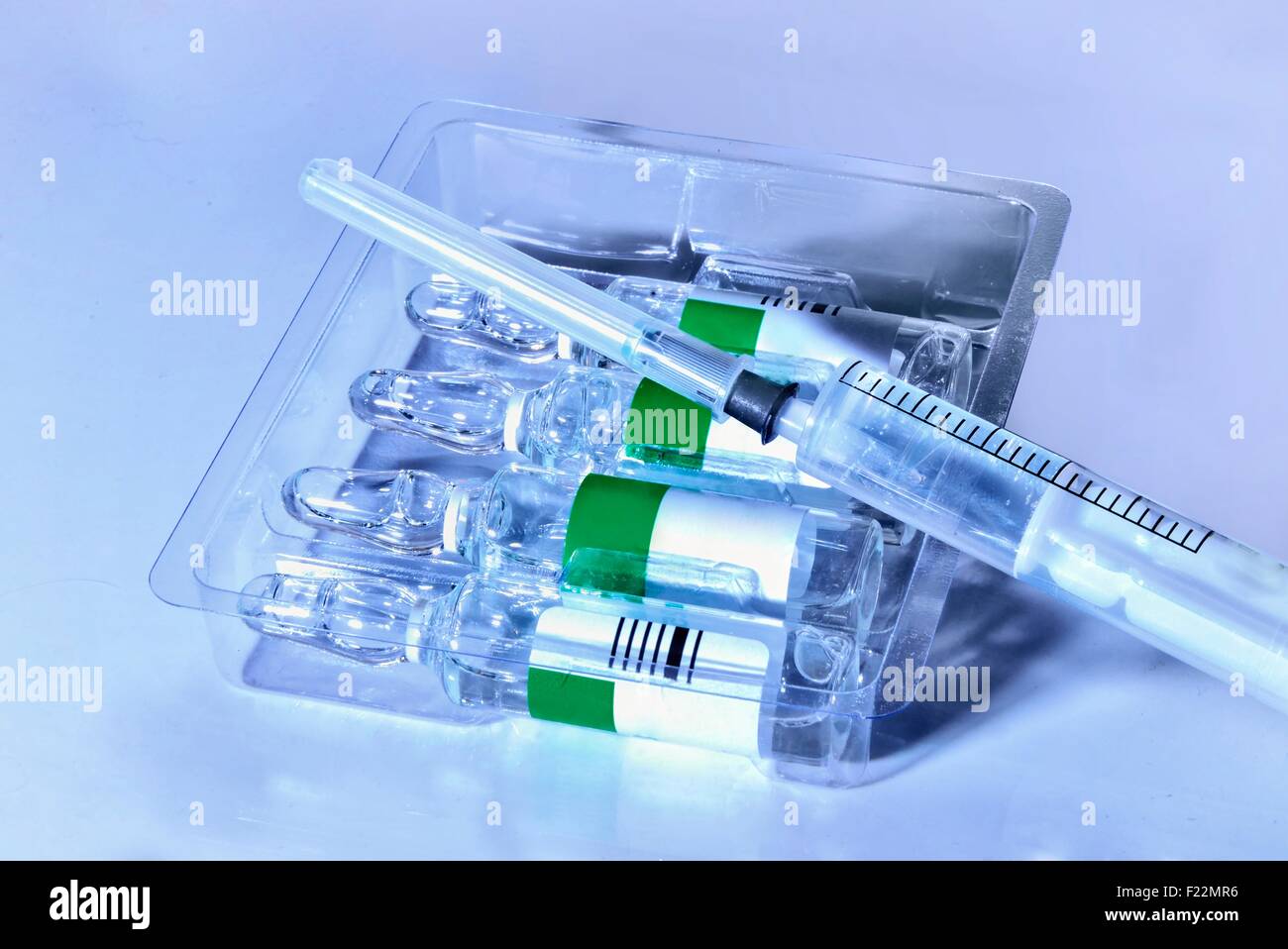 plastic medical syringe and ampoule with needle before make drug ...