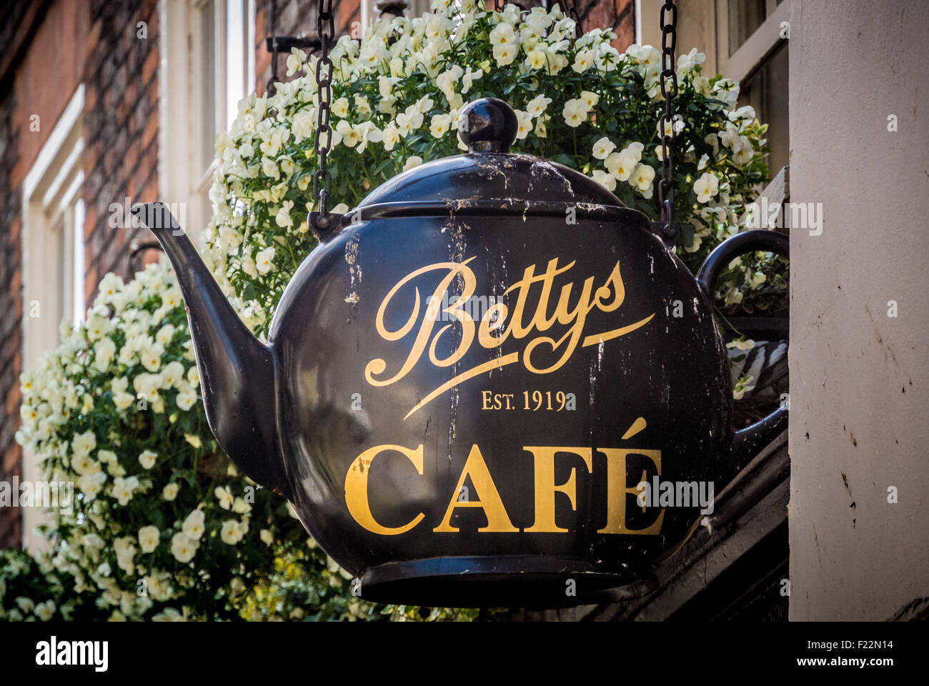 Teapot shaped exterior sign at Little Bettys Cafe Stock Photo