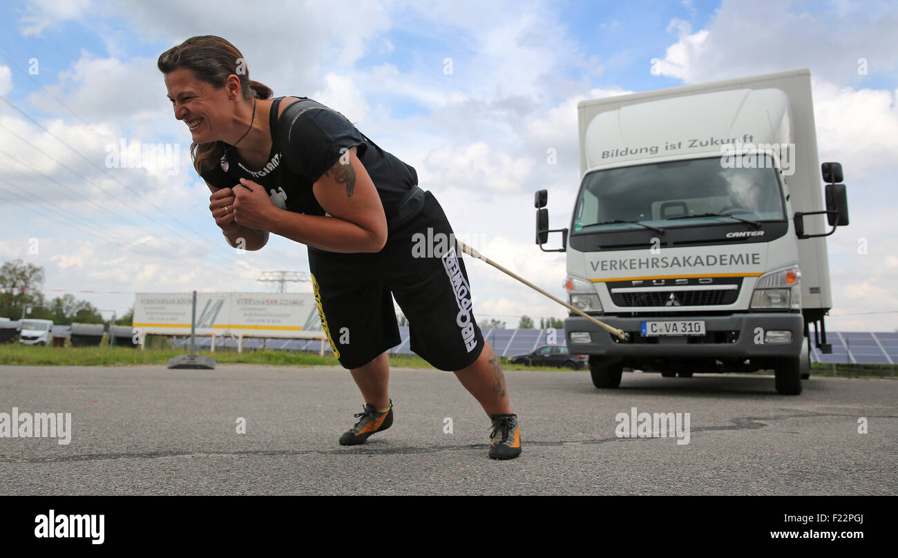 Chemnitz, Germany. 10th Sep, 2015. Kathleen Krausse, the first female  German truck pull champion, pulls a 7.5-ton truck in Chemnitz, Germany, 10  September 2015. This year's European Truck Pull Championships will be