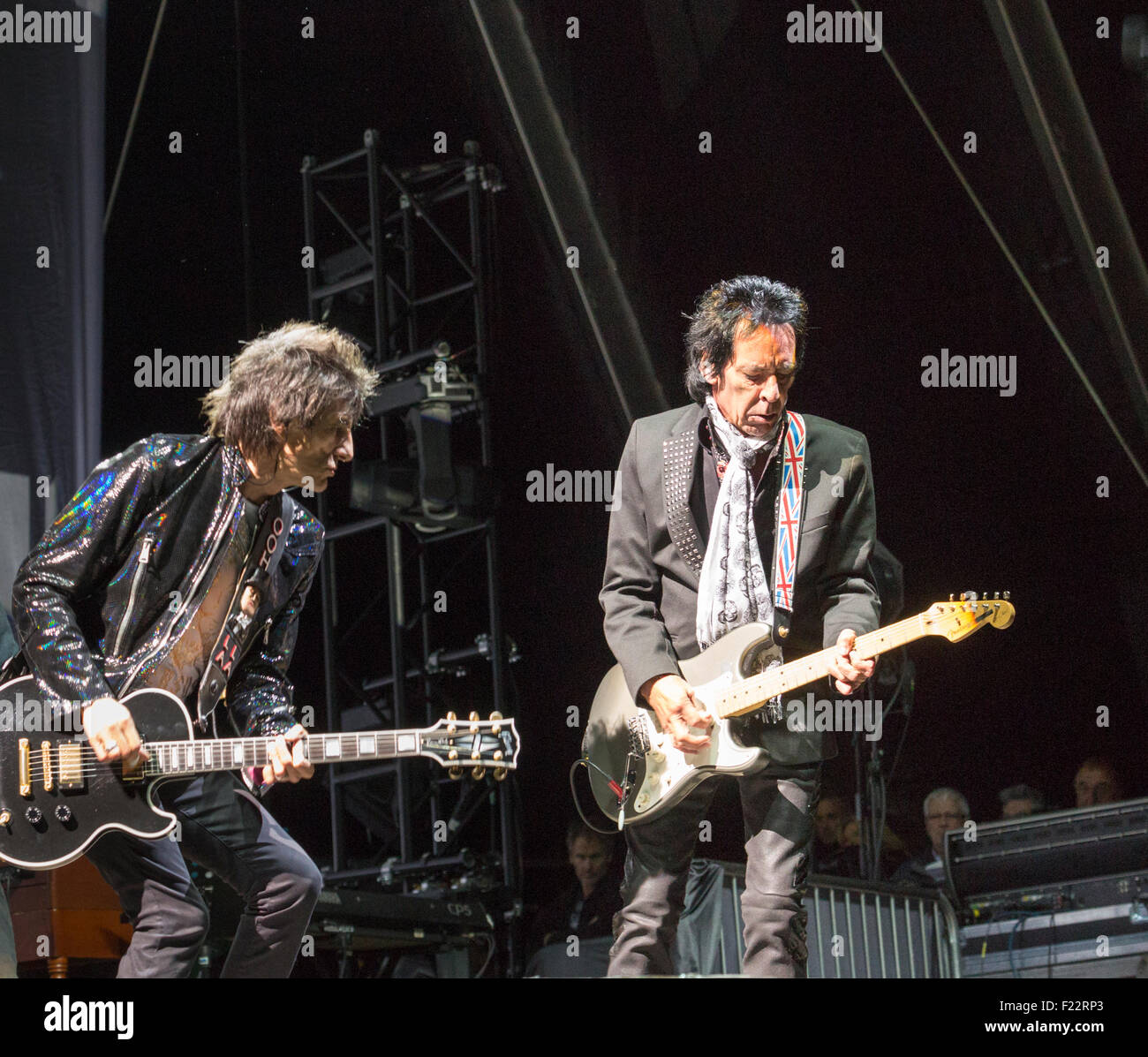 Pop stars Ronnie Wood and Robin le Mesurier jamming, playing guitar with The Faces reunited, performing in concert live on stage, Sept 2015 Stock Photo