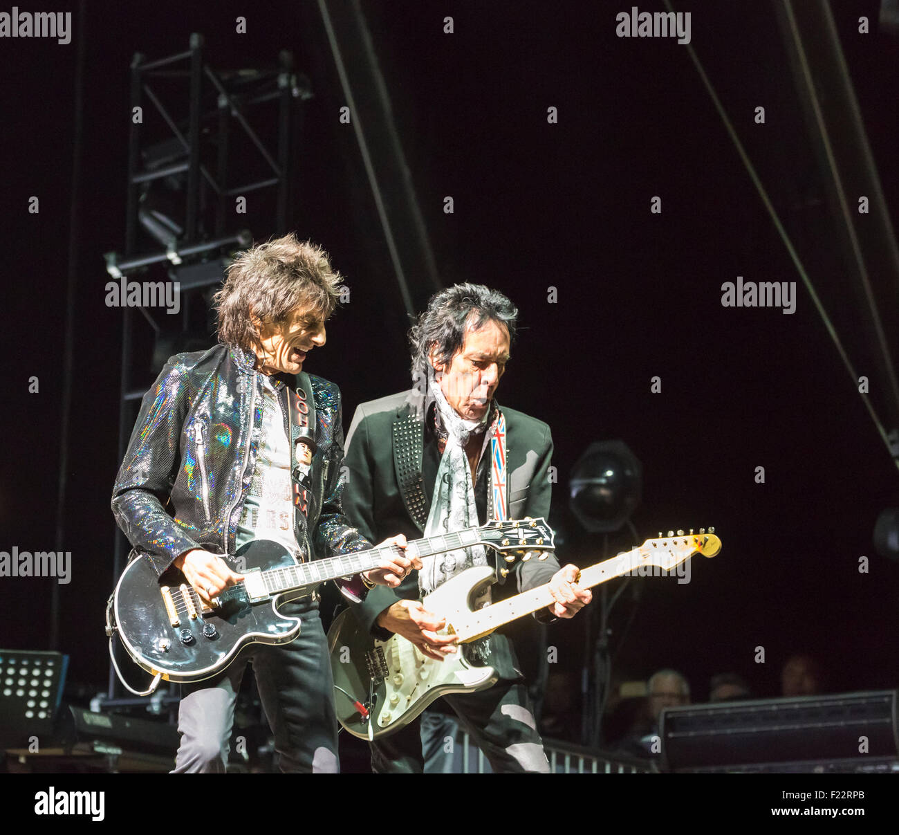 Pop stars Ronnie Wood and Robin le Mesurier jamming, playing guitar with The Faces reunited, performing in concert live on stage, Sept 2015 Stock Photo