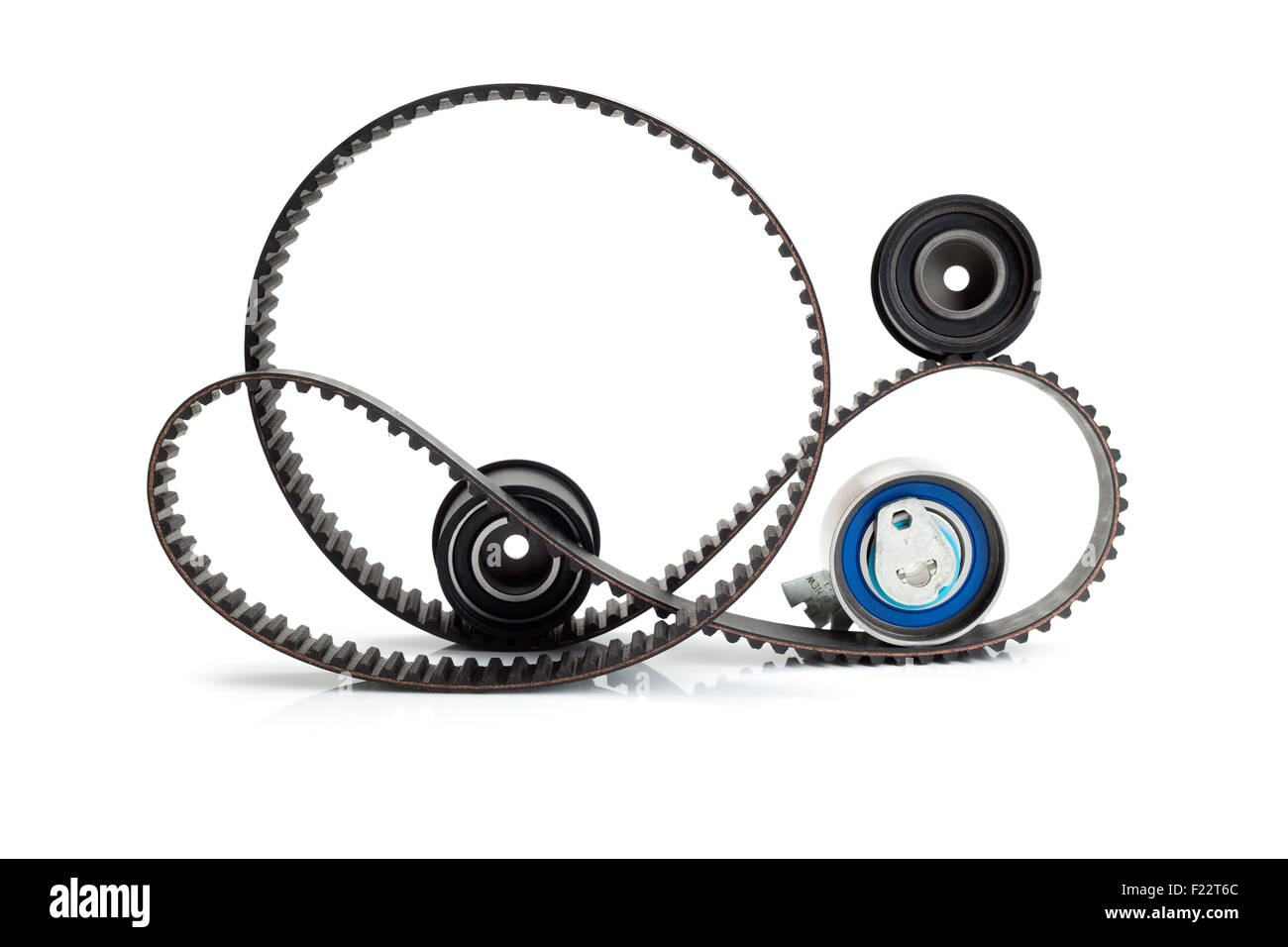 https://c8.alamy.com/comp/F22T6C/timing-belt-two-rollers-and-the-tension-mechanism-isolate-F22T6C.jpg