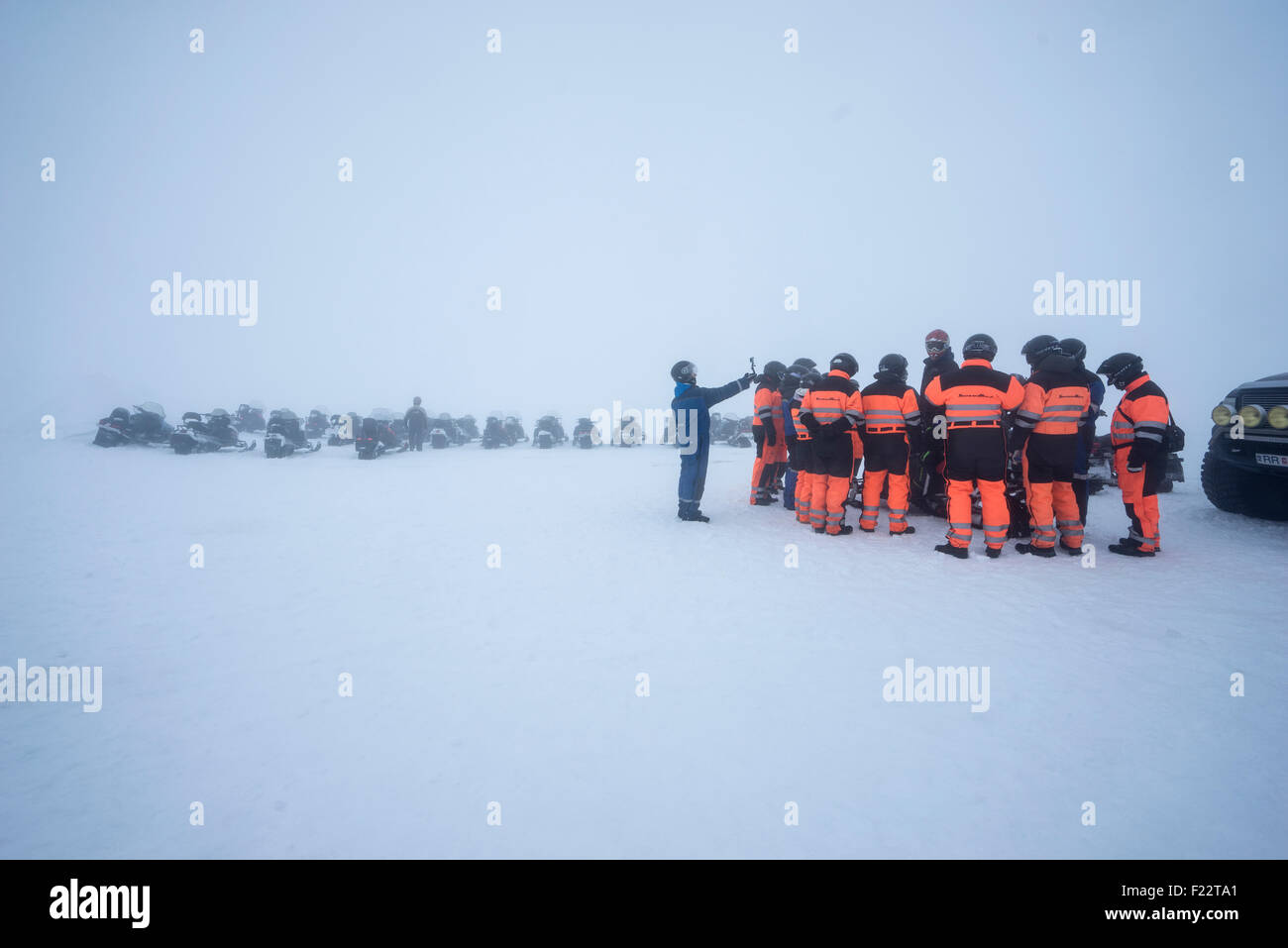 Group of people about to take a  snowmobile trip in the Central Highlands of Iceland. Stock Photo