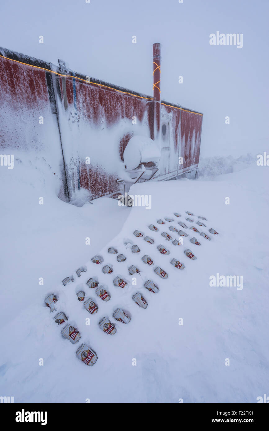 Beer keeping cold in the snow. Snowmobile trip in the Central Highlands of Iceland. Stock Photo