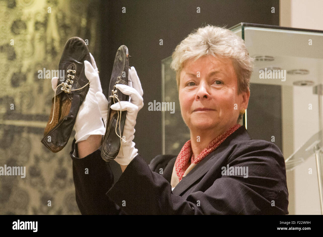 London UK. 10th September 2015. A pair of Black leather running shoes worn by Roger Bannister