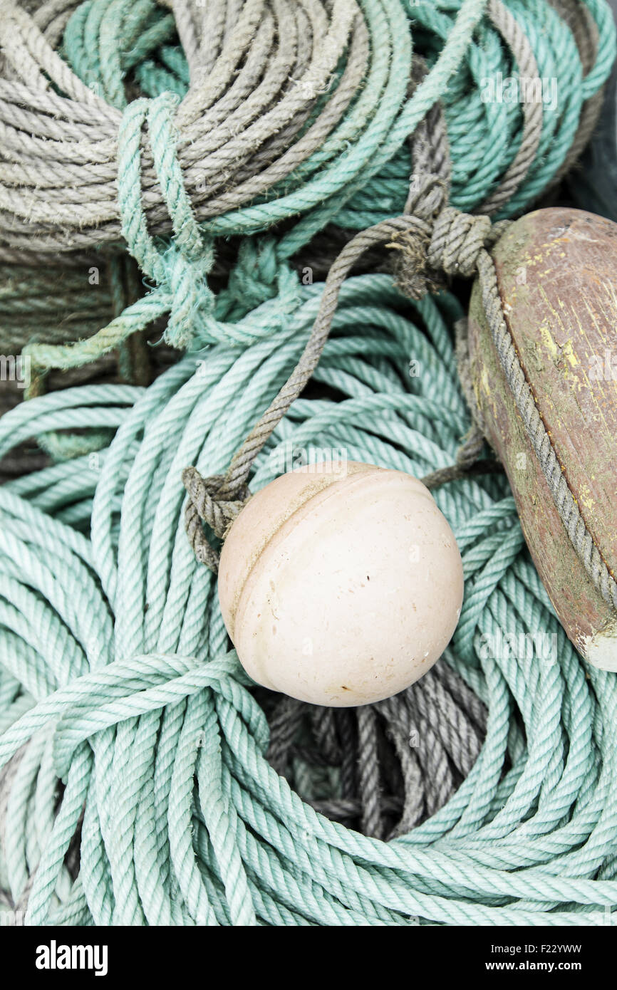 Commercial fishing nets cork floats hi-res stock photography and