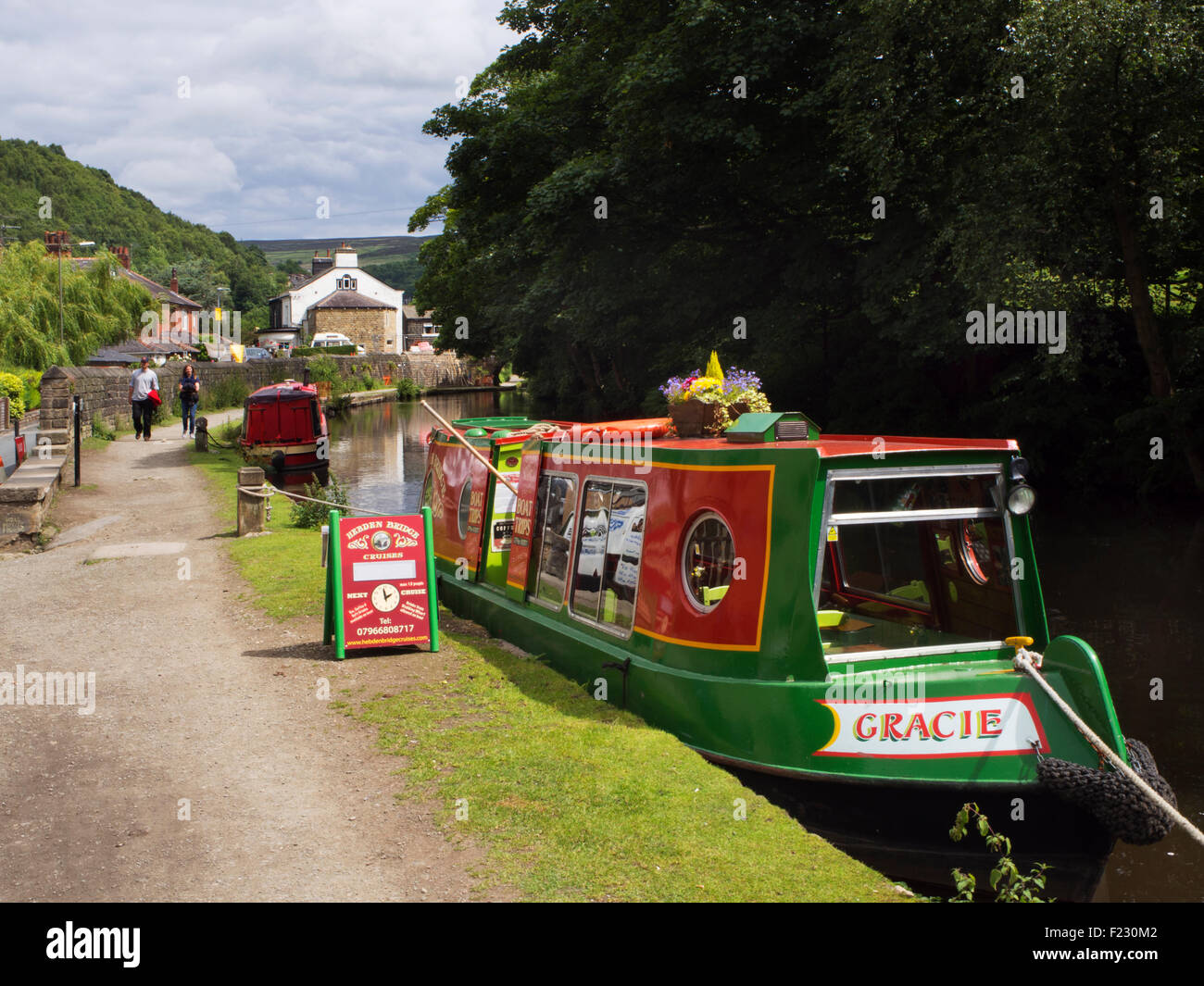 Hebden Bridge Cruises Narrowboat on the Rochdale Canal at Stubbing Wharf Wharf Hebden Bridge West Yorkshire England Stock Photo