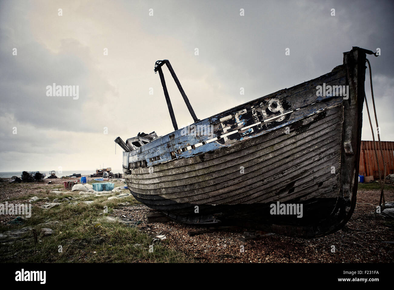 Old wooden boat on beach hi-res stock photography and images - Alamy